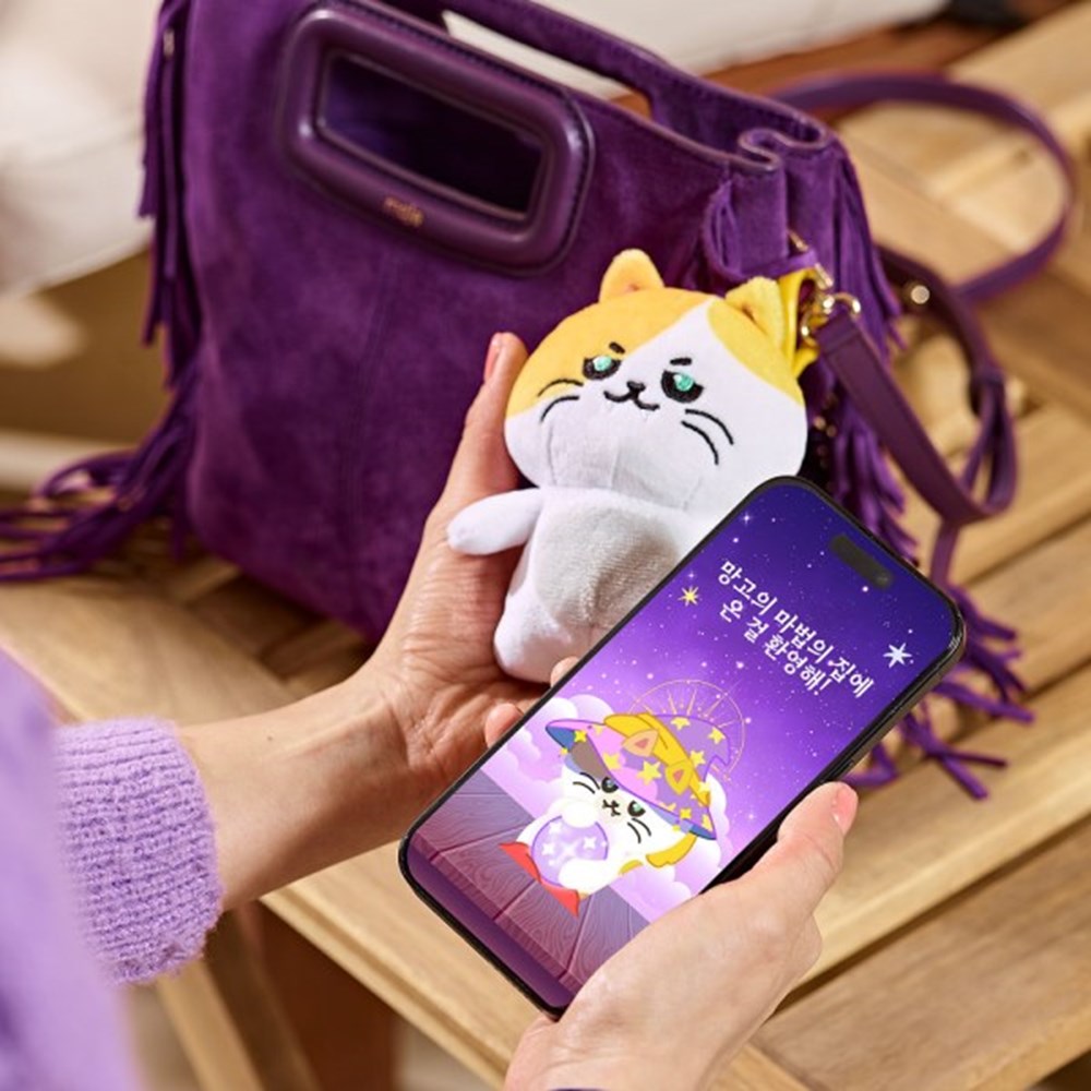 Mango NFC plush — tap to chat with AI